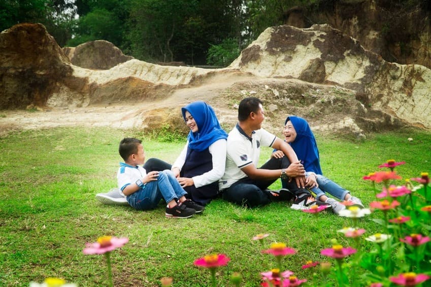 family storytelling outdoors